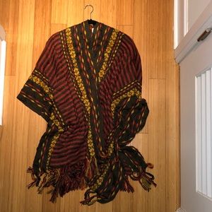 Free People earth-tone sweater poncho